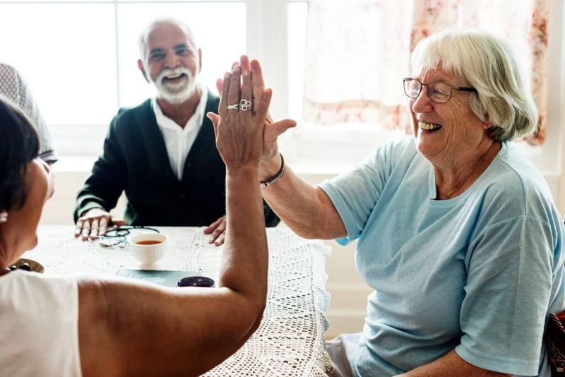 Women giving high-five